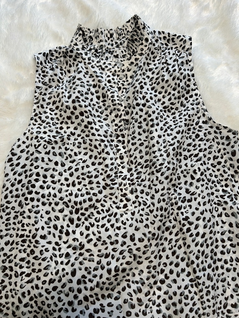 Sleeveless ruffle neck leopard print top